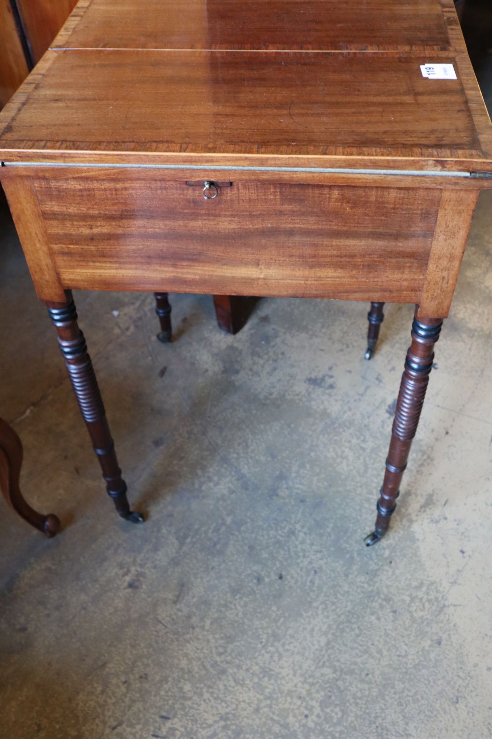 A Regency mahogany and rosewood banded patience table, on ring turned legs, width 83cm